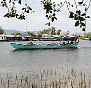 Longtail Boat on Kompong Bay River by Asienreisender